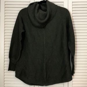 Green turtleneck sweater